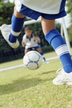 Photo of children playing soccer