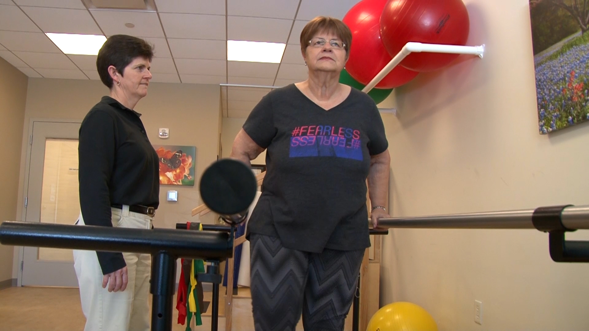 Cancer survivor working with physical therapist