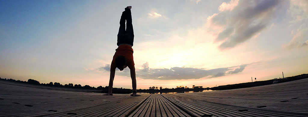 Man doing hand stand