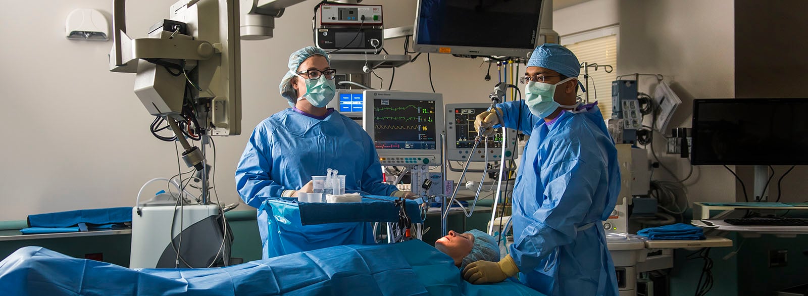 Dr Deepankar Sharma MD in operating room.