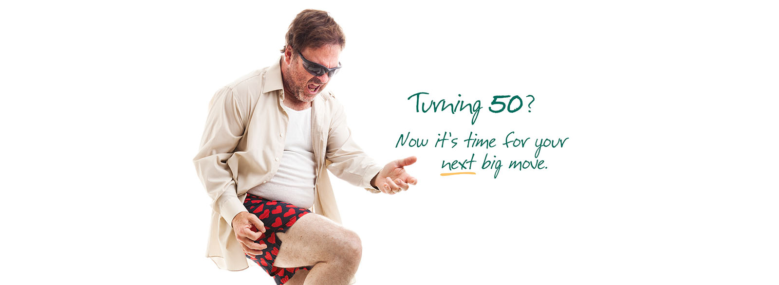 Middle-aged man in boxer shorts playing air guitar