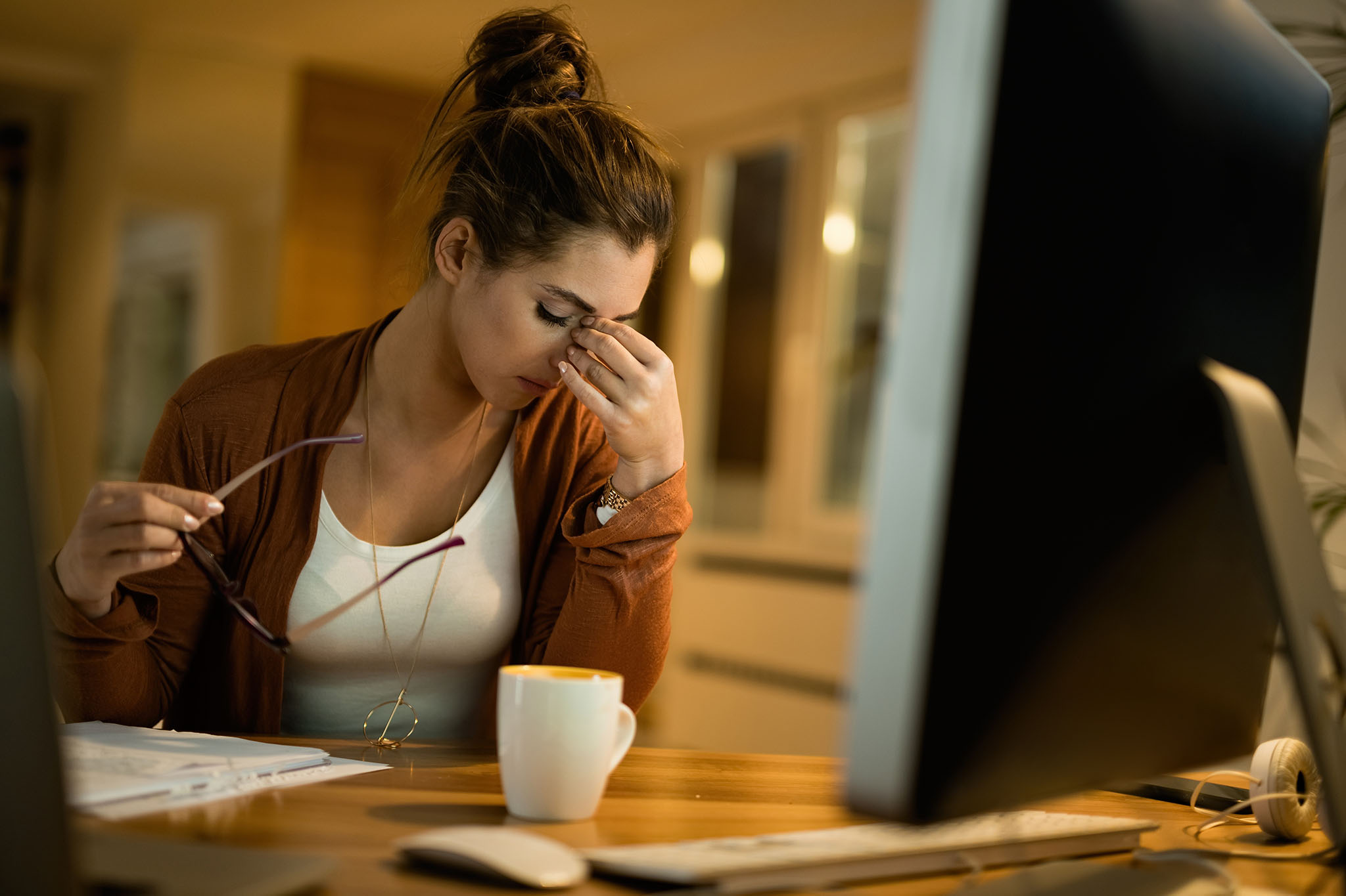 Tired women working at computer.