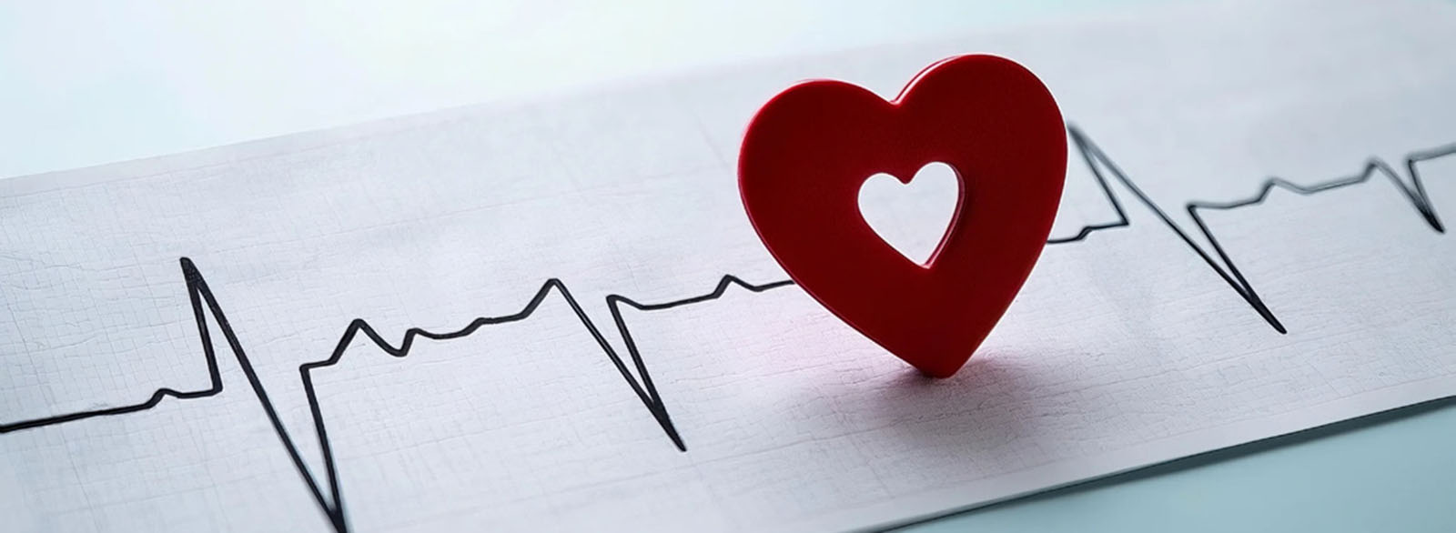 Illustration of heart shape on an EKG printout.