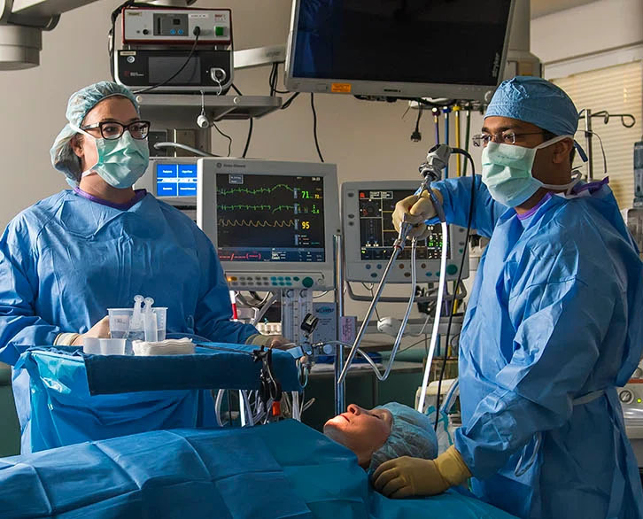 Pulmonologist Dr. Deepankar Sharma scoping a patient.