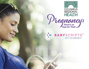 Pregnant woman browsing smartphone.