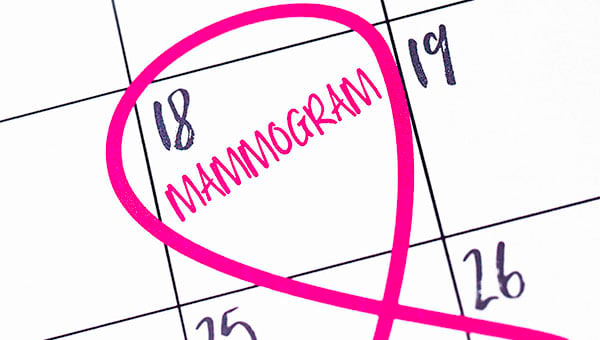 Calendar with a day circled and the word mammogram written in it.