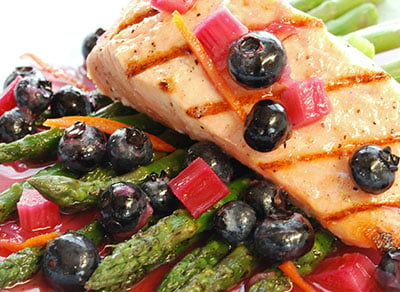 Seared salmon topped with blueberries