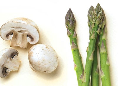 Raw mushrooms and asparagus