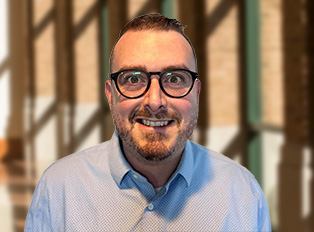 Portrait of Riley Alexander, MD.